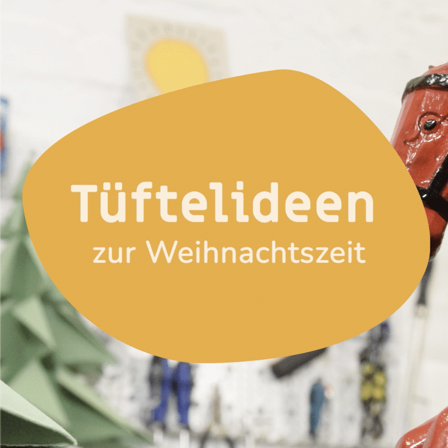 Eine Orangene Fläche mit der Beschriftung "Tüftelideen zur Weihnachtszeit"